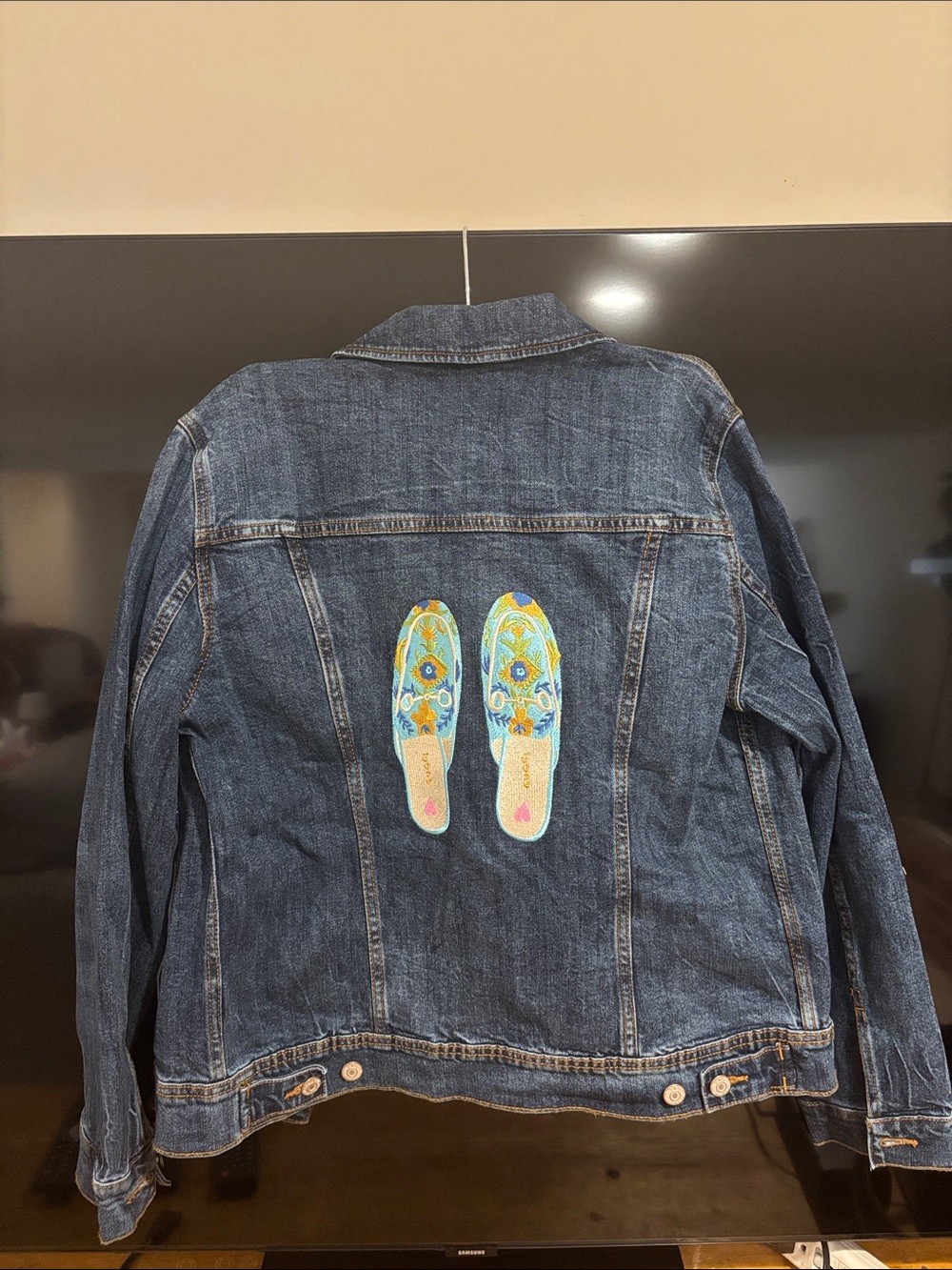 Denim Jacket with embroidered Gucci slippers